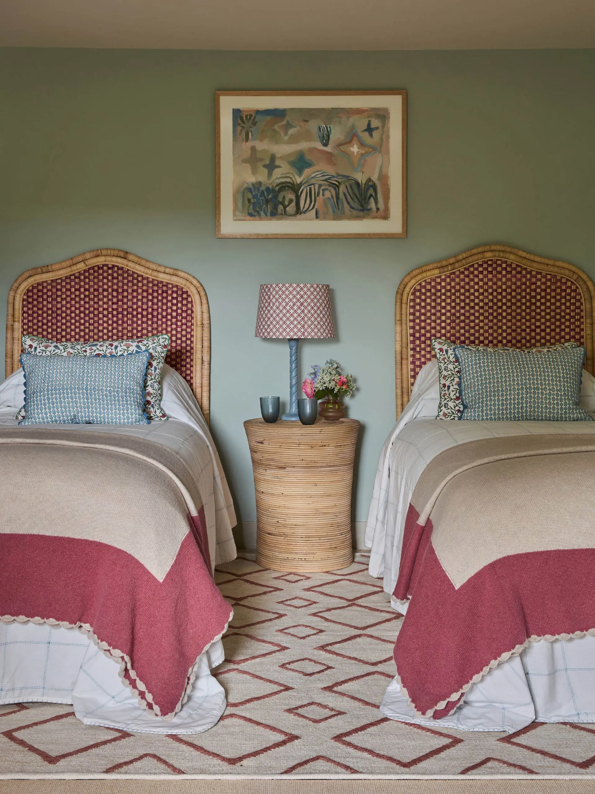 Pink bordered knitted throw