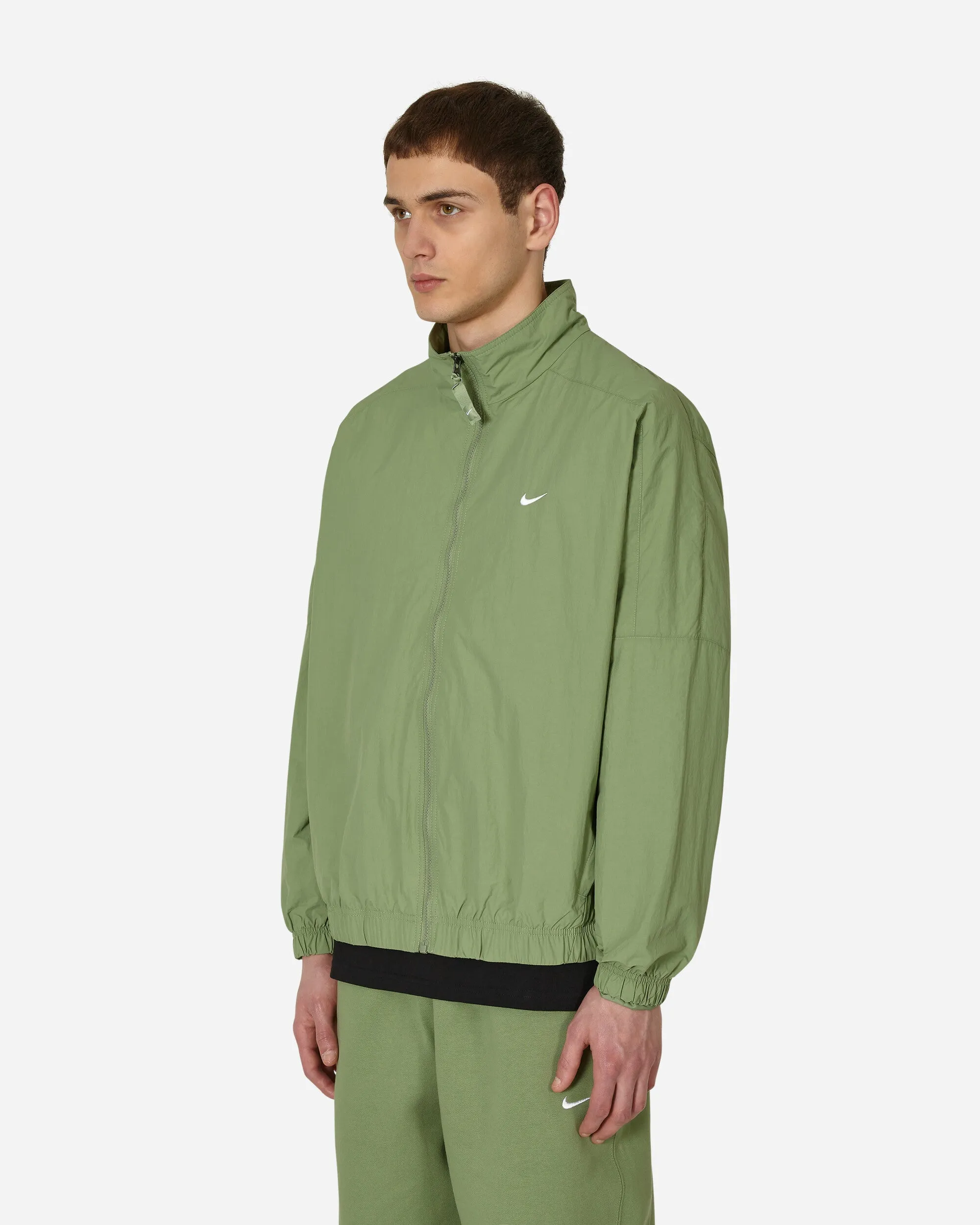 Solo Swoosh Woven Track Jacket Green